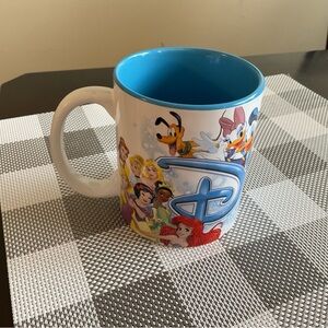 Disney Mug with Blue Interior and Colorful Characters